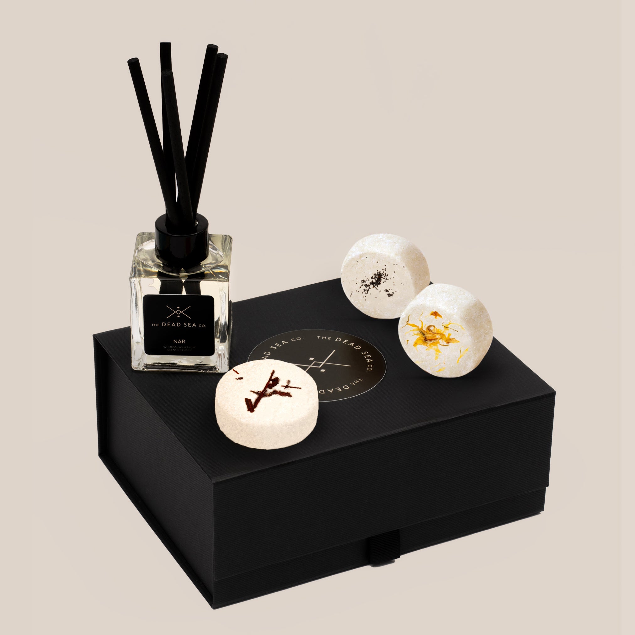 Limited Edition Hammam Sanctuary Set with reed diffuser and aromatherapy shower steamers displayed on a beautifully packaged gift box. Designed for a spiritual, hammam-inspired self-care ritual.