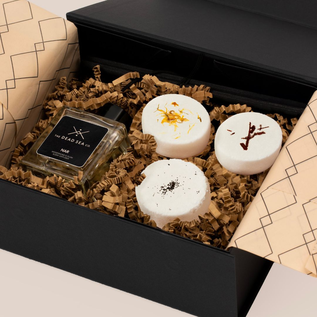 Limited Edition Hammam Sanctuary Set in a beautifully packaged gift box, featuring a reed diffuser and three aromatherapy shower steamers in autumnal scents, perfect for an indulgent self-care ritual.