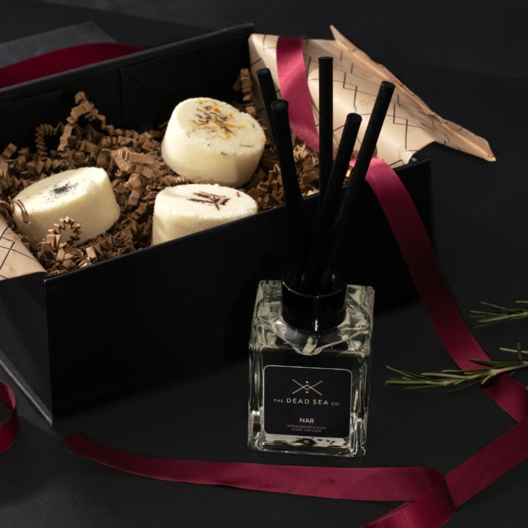 Limited Edition Hammam Sanctuary Set in a beautifully packaged gift box, featuring a reed diffuser and three aromatherapy shower steamers in autumnal scents, perfect for an indulgent self-care ritual.