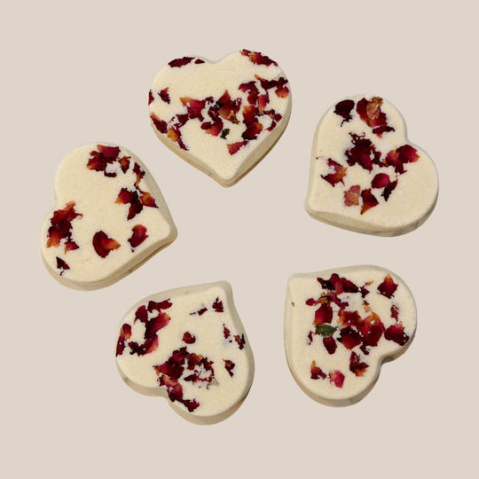 Heart-shaped aromatherapy shower steamers infused with essential oils.